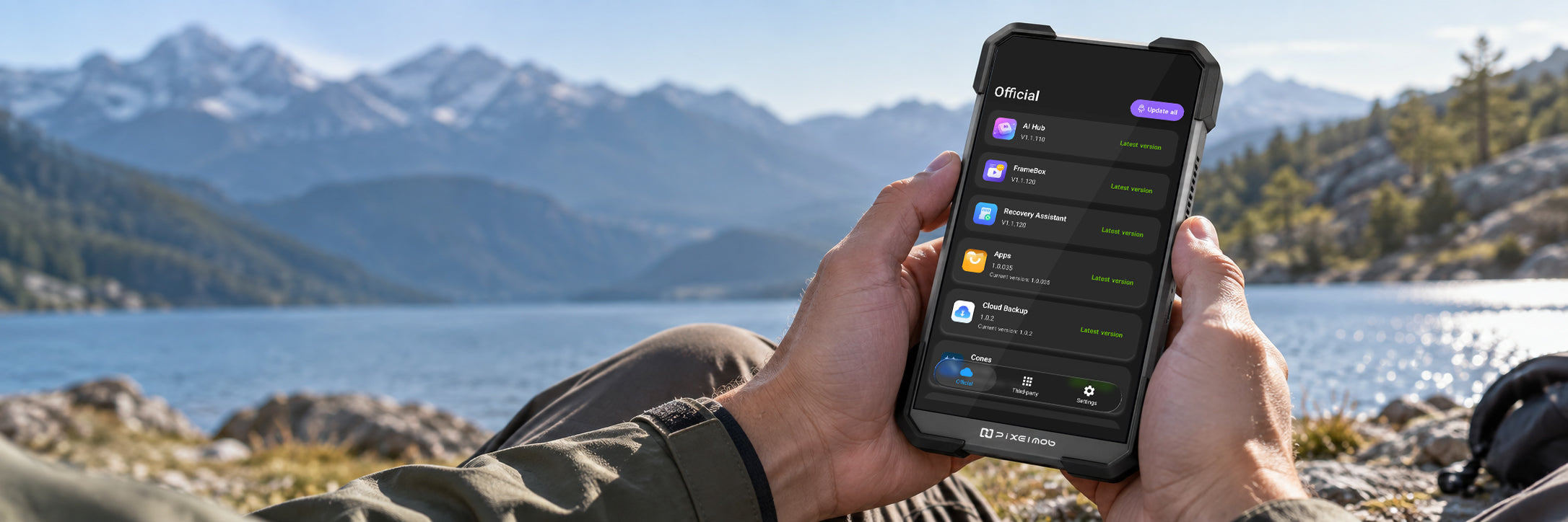 PixelMob apps on screen beside a mountain lake