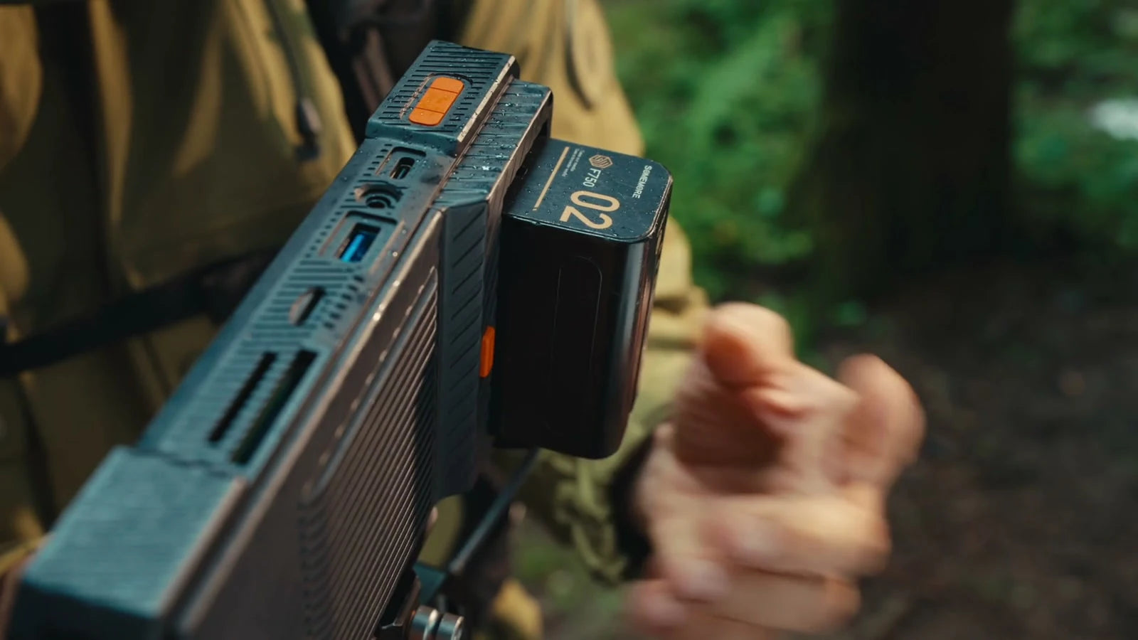 An NP-F battery attached to PixelMob Pro during an outdoor shoot